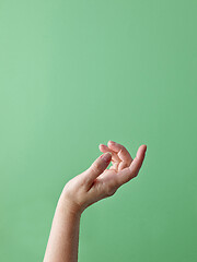 Image showing hand on green background