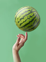 Image showing watermelon and human hand