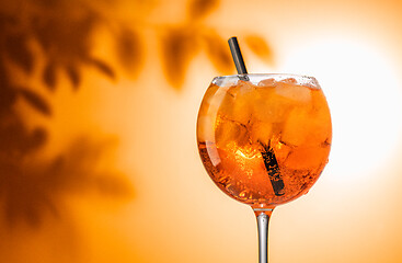 Image showing glass of orange cocktail