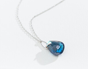 Image showing silver chain with blue gemstone