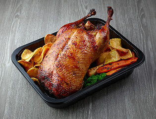 Image showing duck roast on grey table