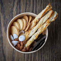 Image showing various cookies in cardboard cup