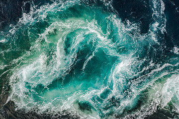 Image showing Waves of water of the river and the sea meet each