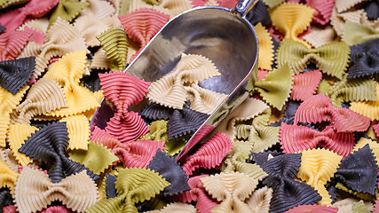Image showing Colored Farfalle Pasta bow tie pasta background.