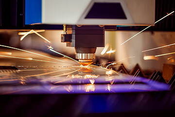 Image showing CNC Laser cutting of metal, modern industrial technology.