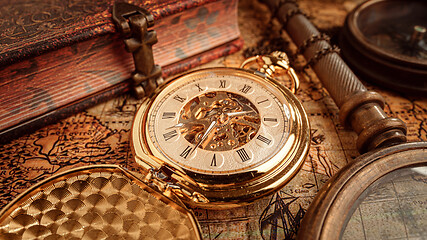 Image showing Vintage pocket watch. Vintage background Concept of time history