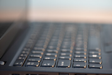 Image showing Macro shot of laptop with black keyboard