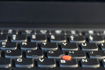 Image showing Macro shot of laptop with black keyboard