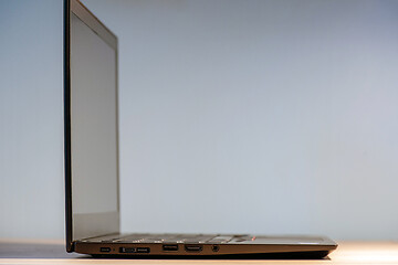 Image showing Side view to the slim laptop