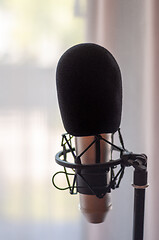 Image showing Close up of microphone in studio room, blur background