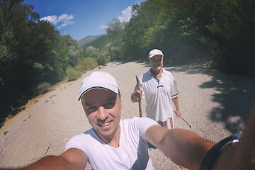 Image showing dad and son taking selfie photos