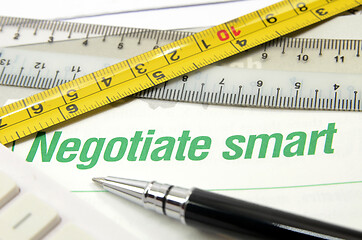 Image showing Negotiate smart printed on a book