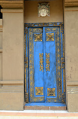 Image showing Traditional blue painted front doors of a house in Bali