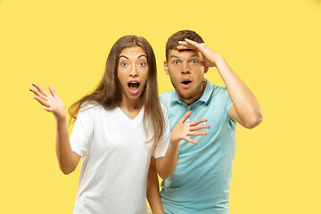 Image showing Beautiful couple isolated on yellow studio background