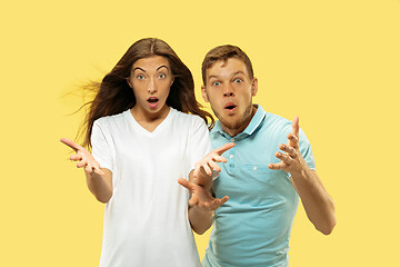 Image showing Beautiful couple isolated on yellow studio background