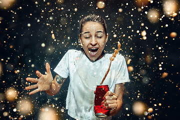 Image showing Woman drinking a cola