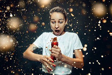 Image showing Woman drinking a cola