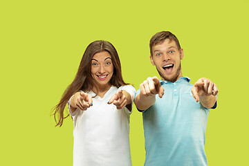 Image showing Beautiful couple isolated on green studio background