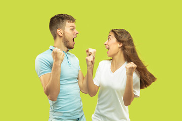 Image showing Beautiful couple isolated on green studio background