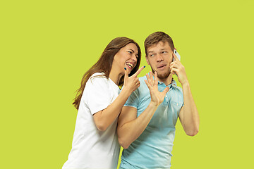 Image showing Beautiful couple isolated on green studio background