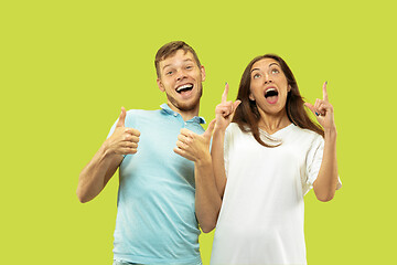 Image showing Beautiful couple isolated on green studio background