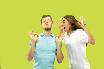 Image showing Beautiful couple isolated on green studio background