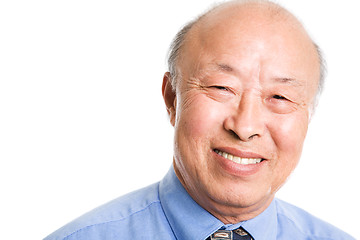 Image showing Smiling senior asian businessman