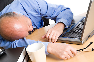 Image showing Sleeping senior asian businessman