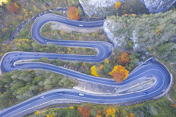 Image showing Curvy road in autumn forest