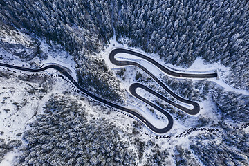 Image showing Winter road in rocky mountains