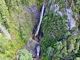 Image showing Rock waterfall in a green forest