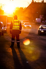 Image showing Police officer observe busy traffic