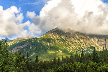 Image showing Polish Tatra mountains summer landscape with blue sky and white clouds.