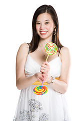 Image showing Beautiful asian woman and lollipops