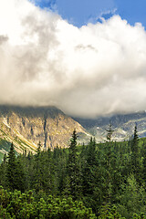 Image showing Polish Tatra mountains summer landscape with blue sky and white clouds.