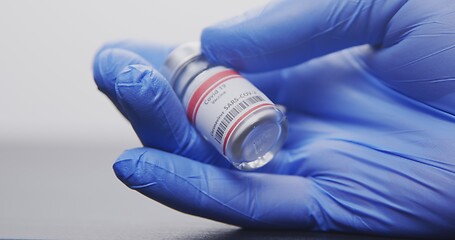 Image showing Vaccine in human hands closeup footage