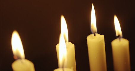 Image showing Candles glowing against dark background