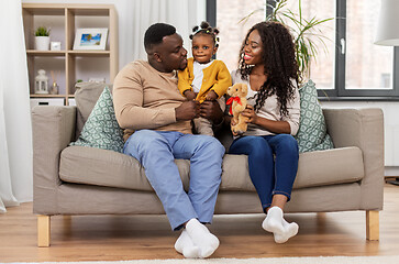 Image showing happy african family with baby daughter at home