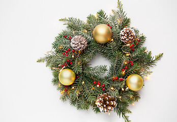 Image showing christmas fir wreath with balls, cones and lights