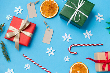 Image showing christmas gifts, tags and decorations