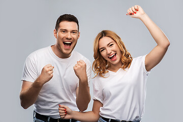 Image showing portrait of happy couple in white t-shirts