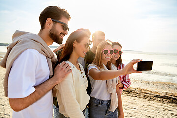 Image showing happy friends taking selfie in summer