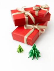 Image showing gift boxes and christmas trees on white background