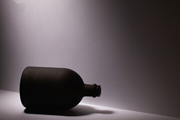 Image showing Luxury Black Glass of Rum on the white background