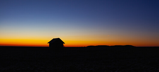 Image showing Old barn on the field at sunrise