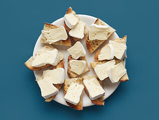 Image showing plate of toasted bread with brie