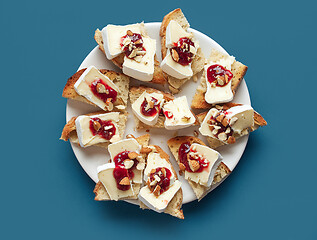 Image showing plate of toasted bread with brie