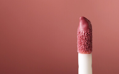 Image showing close up of lipgloss brush