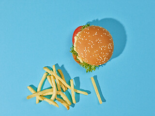 Image showing fresh tasty burger and fries