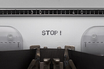Image showing Typing text on typewriter